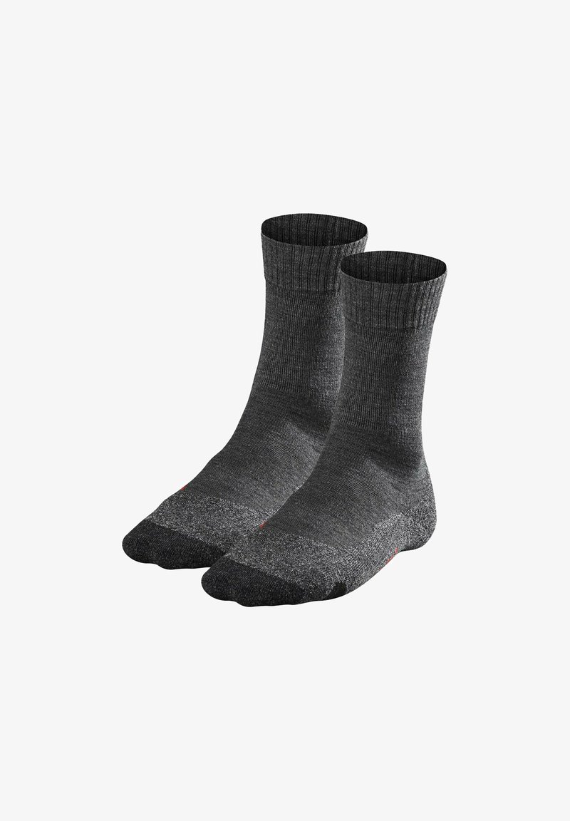 Chaussettes grises en tissu texturé, dotées d'une bordure côtelée et d'un renfort à la zone des orteils, avec des accents subtils.