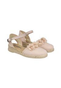 Espadrilles de lona rosa claro con un acento de tela floral en la puntera, talón abierto y tira de tobillo ajustable. Suela de yute natural.