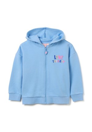 Felpa zip con cappuccio azzurro chiaro realizzata in morbido cotone, dotata di tasca anteriore, polsini a costine e la scritta "LOVE THERAPY" ricamata in lettere colorate.