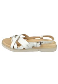 White leather sandal with crisscross straps, adjustable buckle, and a padded footbed on a light-colored outsole.