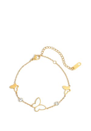 Delicate gold chain bracelet with three butterfly charms and two small clear gemstones, adjustable clasp on a white background.