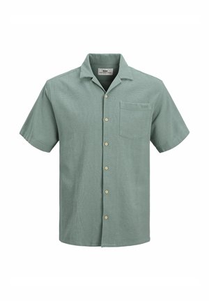 Short-sleeve green button-up shirt made of textured fabric, featuring a chest pocket and light wooden buttons.