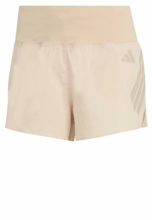 Shorts de sport beige avec une large ceinture élastique et un logo Adidas discret sur la jambe droite.