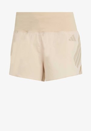 Shorts de sport beige avec une large ceinture élastique et un logo Adidas discret sur la jambe droite.