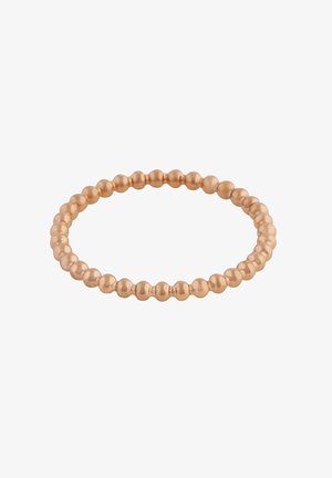 Bracelet extensible en petites perles rondes de couleur or rose disposées en boucle continue sur fond blanc.