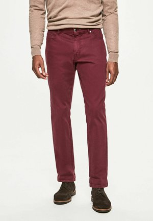 Burgundy men's pants made of cotton blend, featuring a slim fit, five pockets, and a zipper fly with a button closure.