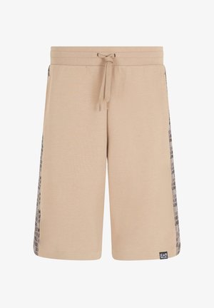 Puha anyagból készült bézs rövidnadrág, húzózsinórral ellátott derekkal, sötét nyomott részletekkel az oldalán. Fekete EA7 logó kívágás az alján.