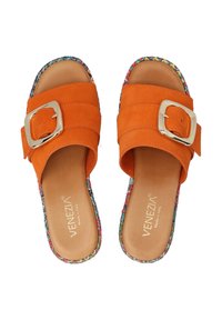 Orange suede slide sandals with a wide strap and a silver buckle. Floral-patterned edge detail. Smooth inner sole with brand logo.