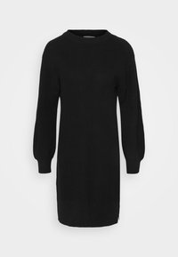 Robe-pull noire en maille avec un col rond, des manches longues bouffantes et des fentes latérales à l'ourlet pour faciliter les mouvements.