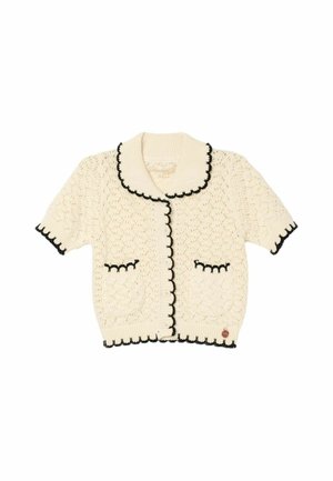Kremfarvet kortærmet strikket cardigan med sort bølget kant, knapper foran, to forlommer og en bred ribstrikket krave.