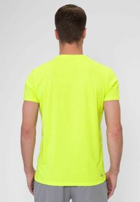 BIDI BADU SPIRIT LOGO CHILL - T-shirt de sport - gelb