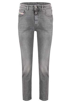 Szare slim-fit dżinsy z pięcioma kieszeniami, zapinane na guziki, z delikatnym wyblaknięciem na przednich partiach ud i kolanach.