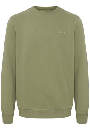 Olive zeleno majico s krojenim ovratnikom, narejeno iz mehkega blaga, z majhnim logotipom "blend" v svetlo sivi barvi na prsih ter z rebrastimi man�šetami in ovratnikom.