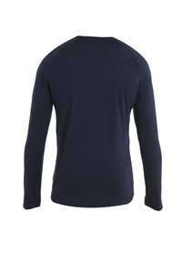Navy blue long-sleeve shirt shown from the back with a simple, seamless design on a white background.