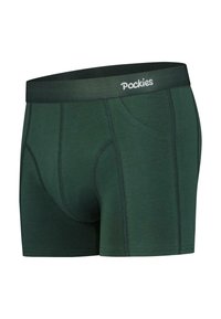 Shorts boxeurs verts avec une taille noire portant le logo "Pockies". Tissu lisse, design ajusté et détails de couture contrastés.