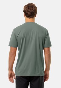 Jack Wolfskin DELGAMI S/S  - Sport T-Shirt - hedge green