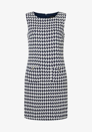 Abito senza maniche in un motivo a scacchi navy e bianco. Presenta un collo rotondo, una cerniera sul retro e due tasche frontali con dettagli metallici.