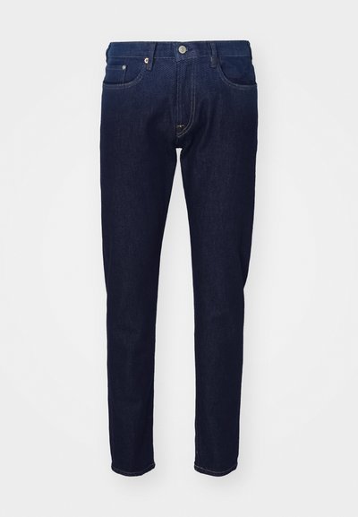 Vaqueros azul oscuro hechos de denim, con un diseño clásico de cinco bolsillos, cierre de botón y corte recto con un mínimo desgaste.