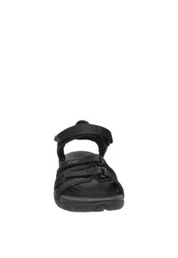 Svart sandal med flera justerbara remmar, strukturerad fotbädd och en vadderad sula. Har en robust design för komfort och stabilitet.