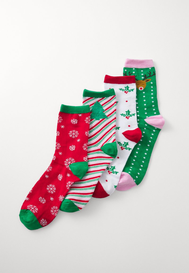 Fünf Paare von weihnachtlichen Socken: rot mit Schneeflocken, gestreift in rot/grün, weiß mit Stechpalme, grün mit Rentieren, grün mit Punkten.