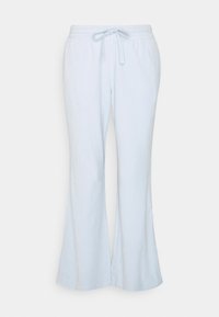 Pantalones de lounge acampanados de color azul claro, hechos de una tela suave, con una cinturilla elástica y un cordón para un ajuste ajustable y una textura suave.