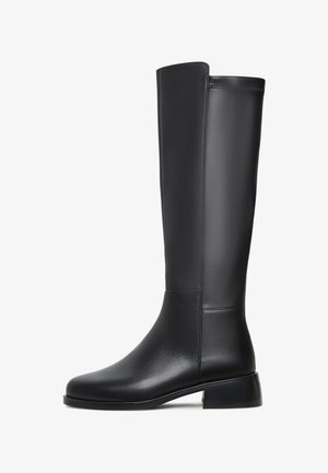 Black leather knee-high boot with a smooth texture, rounded toe, low block heel, and subtle stitching detail along the side.