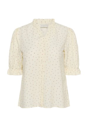 Bluza crem cu imprimeu floral roz mic, mâneci scurte bufante, guler cu volane și nasturi în față.