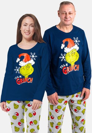 Navy long-sleeve shirts with a Grinch graphic and white snowflakes; gray pajama pants featuring colorful Grinch patterns.
