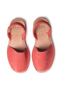 Red suede sandals with open toe and back, featuring a flat sole and stitch detailing. Size marked as 37 on the insole.