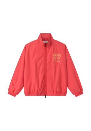 Punane tõmblukuga jakk elastsete varrukate ja vöökohaga, kollase lillemustriga tikand ning vasakul rinnal kiri "Aberdeen Cotton".