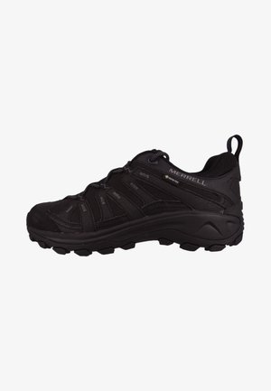Black Merrell hiking shoe with synthetic upper, textured detailing, reinforced toe cap, and a rugged, multi-directional sole for grip.