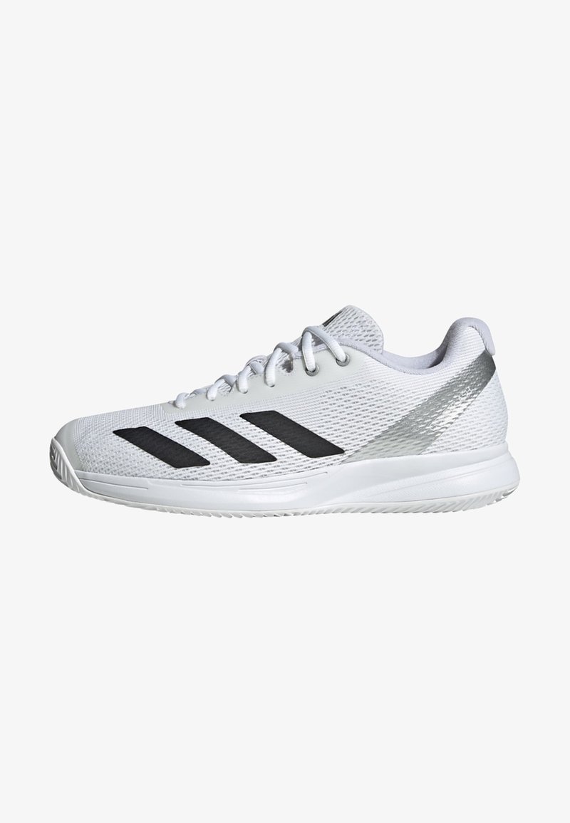 White athletic shoe with black stripes, textured mesh upper, padded collar, and silver accents on heel, featuring a durable rubber sole.