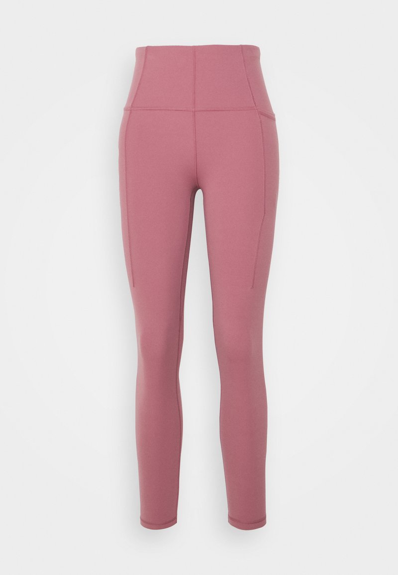 Leggings de cintura alta em rosa poeirento com detalhes de costura visíveis e bolsos laterais, projetados para vestuário ativo e conforto.