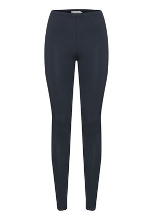 Námořnické modré legíny vyrobené z pružné a hladké látky. Mají vysoký pas a těsně přiléhající střih bez kapes nebo ozdob.