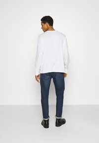 Levi's® 502™ TAPER HI BALL - Calças de ganga justas - hawthorne shocker knot
