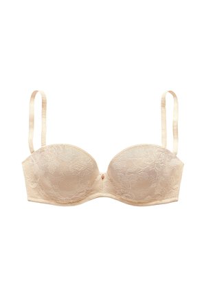Beige lace strapless bra with adjustable shoulder straps and lightly padded cups on a white background.