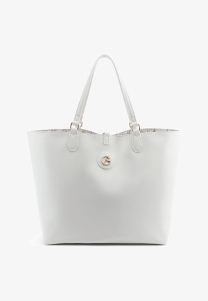 Große weiße Leder-Shopper-Tasche mit doppelten Griffen, einem kreisförmigen goldenen Emblem auf der Vorderseite und einem gemusterten Innenfutter, das oben sichtbar ist.