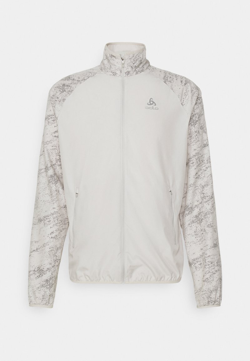 Hellgraue Zip-Jacke mit hohem Kragen, gemusterten Ärmeln, elastischem Saum und Logo auf der linken Brust.