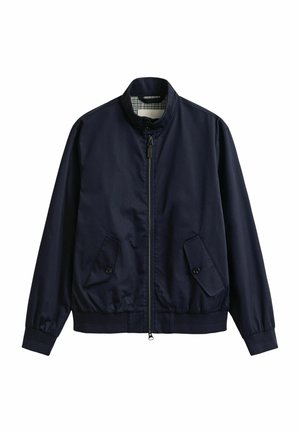 Marineblaue Reißverschlussjacke mit Stehkragen, vorderen Taschen mit Knopflappen, elastischen Bündchen und kariertem Innenfutter.