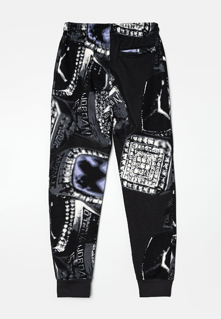 Schwarze Jogginghose mit einem grafischen Aufdruck von Ringen und Ketten in Schattierungen von Silber und Blau, mit einem elastischen Bund und seitlicher Tasche.