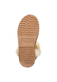 Bruine rubberen zool met zigzagprofiel, met een logo-label "Warmbot AUSTRALIË." Zachte crèmekleurige pluche voering zichtbaar.