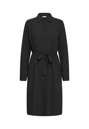 Črna srajčna obleka z dolžinami rokavi in ovratnikom. Ima pas za zavezovanje in teksturirano tkanino. Klasična, ravna krojna zasnova.