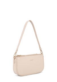 Borsa a mano in pelle beige con forma slim, chiusura a zip e tracolla staccabile. Presenta dettagli in hardware dorato e logo impresso.