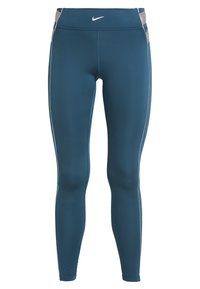 Turkusowe legginsy z wysokim stanem wykonane z elastycznej tkaniny o gładkim wykończeniu. Zawierają logo Nike oraz jasnoszare akcenty wzdłuż szwów bocznych.