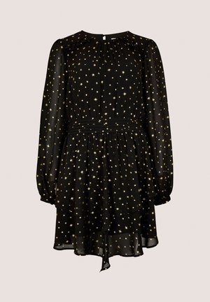 Czarna sukienka z długimi rękawami, z odkrytym dekoltem, elastycznym pasem w talii oraz złotym wzorem gwiazdek na przezroczystym materiale.