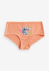 Culottes en coton de couleur pêche avec une taille élastique, ornées d'un motif imprimé de deux personnages de dessin animé et d'un texte ludique.
