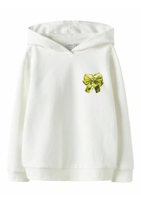 Valge kapuutsiga pusa, mis on valmistatud puuvillakangast, rinnal on roheline lipsu graafiline kujundus. Kapuutsiga disain, millel on soonikud varrukate ääres ja alläär.