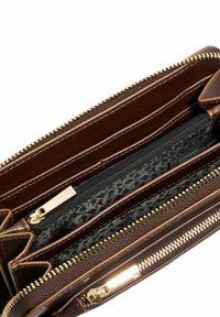 Brown leather wallet with gold-tone zipper. Features multiple compartments and a black patterned lining visible inside. Zippered sections included.