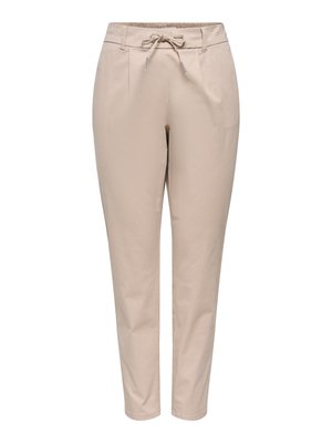 Pantalon beige fuselé avec taille à cordon de serrage et poches latérales, fabriqué en tissu léger.