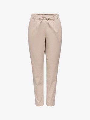 Pantalon beige fuselé avec taille à cordon de serrage et poches latérales, fabriqué en tissu léger.